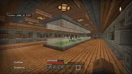 This trading hall design has a pleasing wood and stone aesthetic while also sporting an area for animals (Image via u/Bauuutek/Reddit)